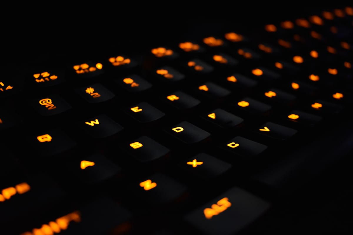 Gaming headset and keyboard on a desk